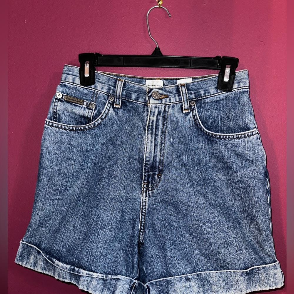 Calvin Klein blue denim shorts with a relaxed fit vibes